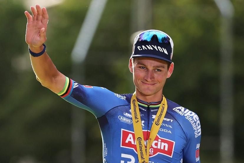 Alpecin - Premier Tech team's Dutch rider Mathieu van der Poel celebrates on the podium after winning the 21st stage of the 113th edition of the Tour de France cycling race, 88,7 km starting and finishing in Paris, on July 26, 2026.  Anne-Christine POUJOULAT / AFP