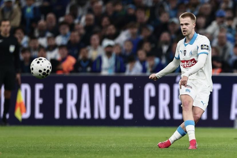 Marseille's Belgian midfielder #18 Arthur Vermeeren kicks the ball during the French Cup quarter final football match between Olympique de Marseille (OM) and Toulouse FC at the Stade Velodrome stadium in Marseille, southern France on March 4, 2026.  Thibaud MORITZ / AFP