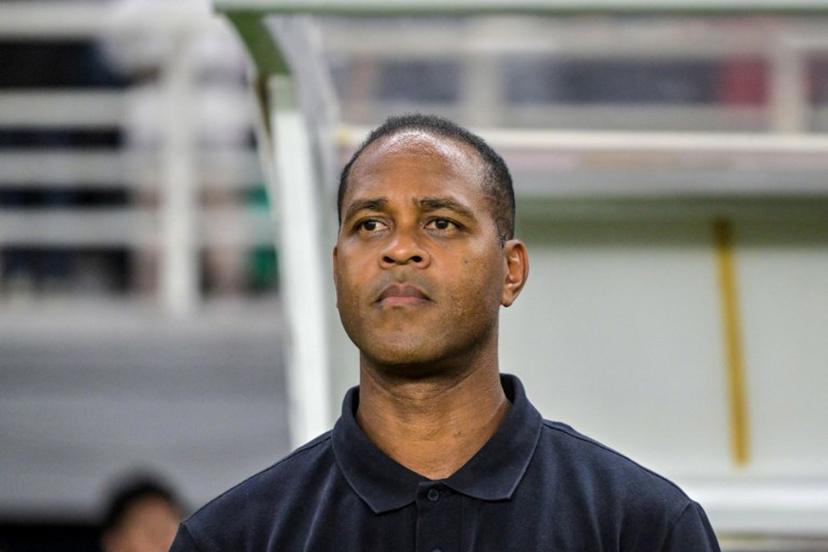Indonesia's Dutch head coach Patrick Kluivert listens to the national anthem prior to the international friendly football match on FIFA Matchday between Indonesia and Taiwan at Gelora Bung Tomo Stadium in Surabaya on September 5, 2025.  Juni KRISWANTO / AFP