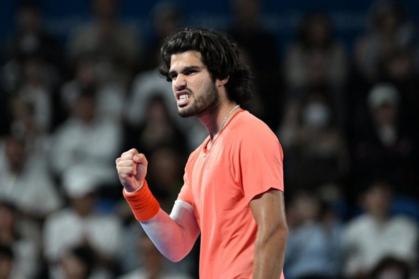 Spain's Carlos Alcaraz reacts after a point against Czech Republic's Jiri Lehecka in the men's singles final during the Japan Open tennis tournament at the Ariake Tennis Forest Park in Tokyo on October 6, 2026.  Rie KIKUCHI / AFP