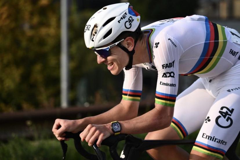 UAE Team Emirates's Slovenian rider Tadej Pogacar cycles in a lone breakawy in the Passo Di Ganda descent during the 119th edition of the Giro di Lombardia (Tour of Lombardy), a 238km cycling race from Como to Bergamo on October 11, 2025.  Marco BERTORELLO / AFP