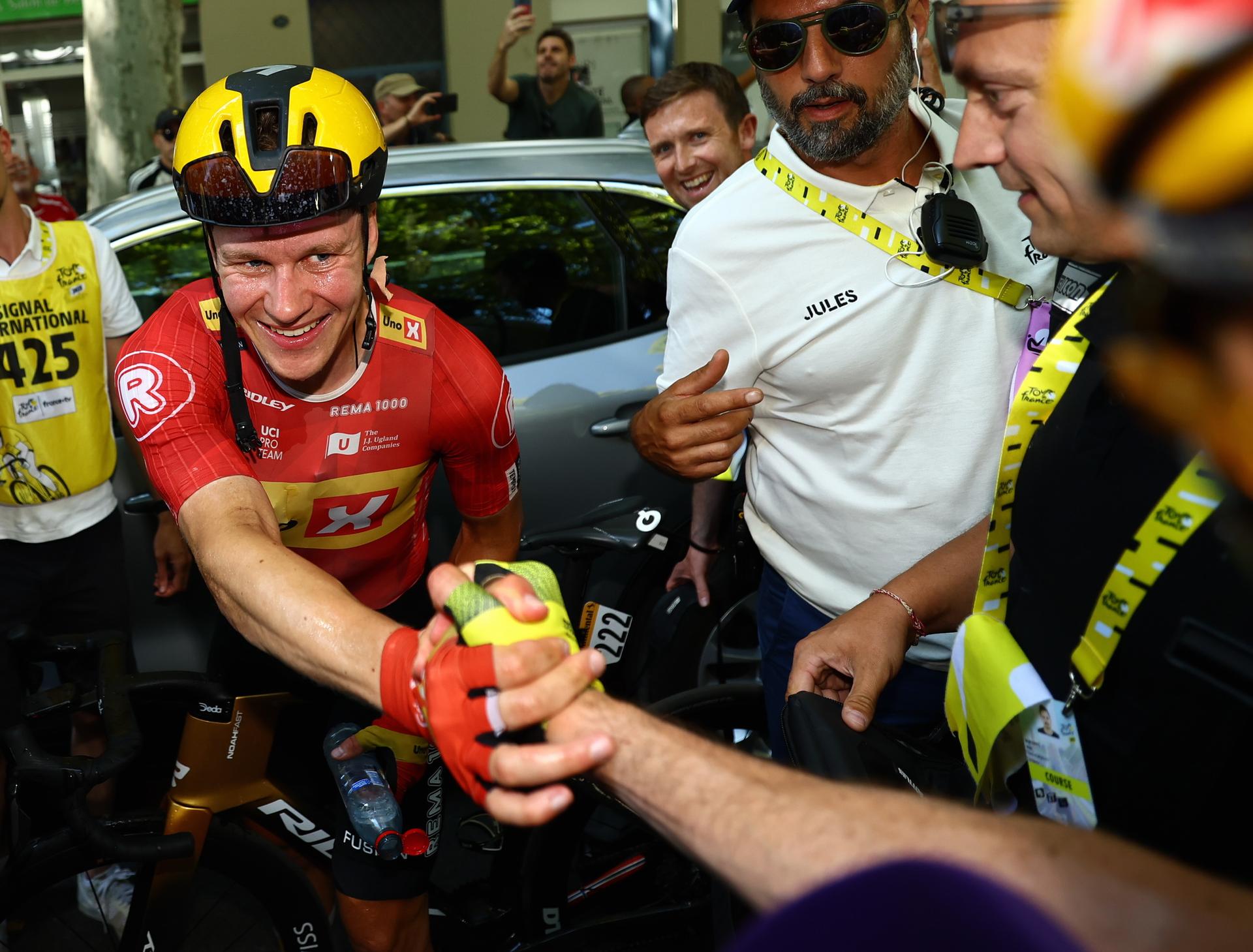 Norwegian Jonas Abrahamsen of Uno-X Mobility and Belgian Wout van Aert of Team Visma-Lease a Bike pictured after stage 11 of the 2025 Tour de France cycling, from and to Toulouse (154km), on Wednesday 16 July 2025 in France. The 112th edition of the Tour de France starts on Saturday 5 July in Lille, France, and will finish in Paris, France on the 27th of July. BELGA PHOTO POOL TIM VAN WICHELEN