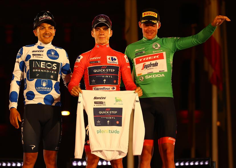 Ecuadorian Richard Carapaz of Ineos Grenadiers wearing the jersey for best climber, winner Belgian Remco Evenepoel of Quick-Step Alpha Vinyl and Danish Mads Pedersen of Trek-Segafredo wearing the green points jersey pictured during the podium ceremony after the final stage of the 2022 edition of the 'Vuelta a Espana', Tour of Spain cycling race, in Madrid, Spain, Sunday 11 September 2022.  BELGA PHOTO DAVID PINTENS