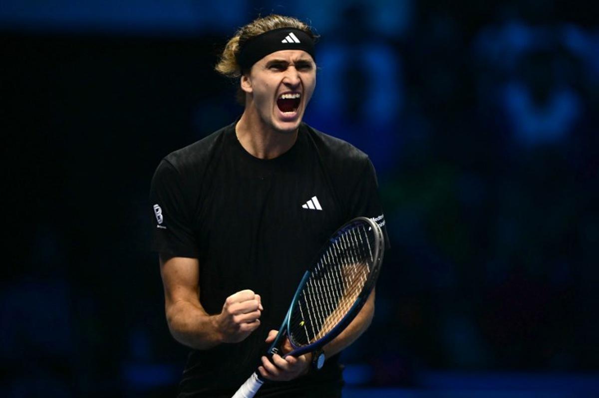 Germany's Alexander Zverev reacts during his match against USA's Ben Shelton at the ATP Finals tennis tournament in Turin on November 9, 2025.  Marco BERTORELLO / AFP