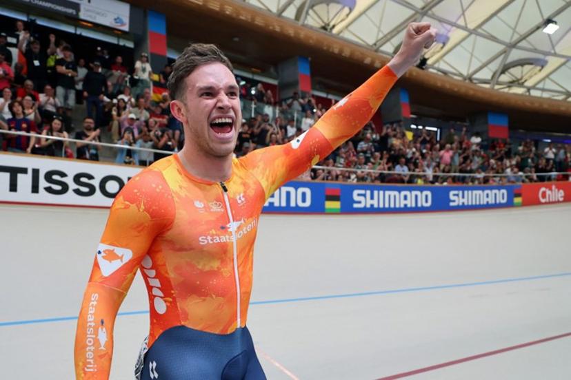 Netherlands' #168 Harrie Lavreysen celebrates winning gold in the men's sprint event final at the 2025 UCI Track World Championships, in the Penalolen Velodrome in Santiago, on October 26, 2025.  Javier TORRES / AFP