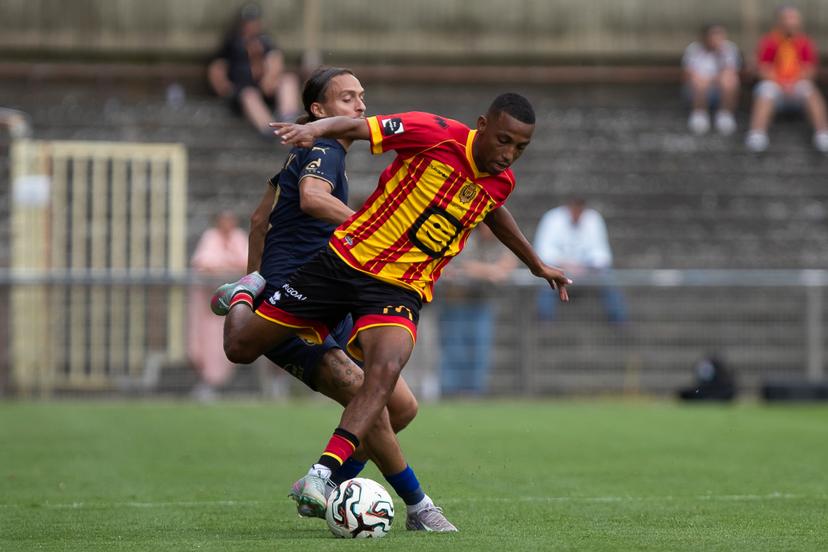 RAAL's Theo Epailly and Mechelen's Rafik Belghali pictured during a friendly soccer game between KV Mechelen and RAAL La Louviere, Saturday 05 July 2025 in Boom, in preparation of the upcoming 2025-2026 season. BELGA PHOTO KRISTOF VAN ACCOM