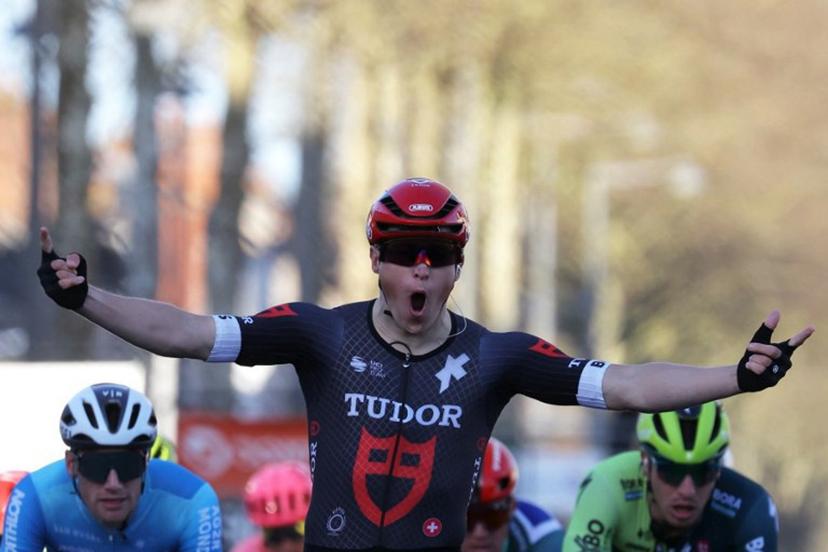 Tudor Pro Cycling Team's Dutch cyclist Arvid De Kleijn celebrates as he crosses the finish line during the 2nd stage of the Paris-Nice cycling race, 179 km between Thoiry and Montargis, on March 4, 2024.  Thomas SAMSON / AFP