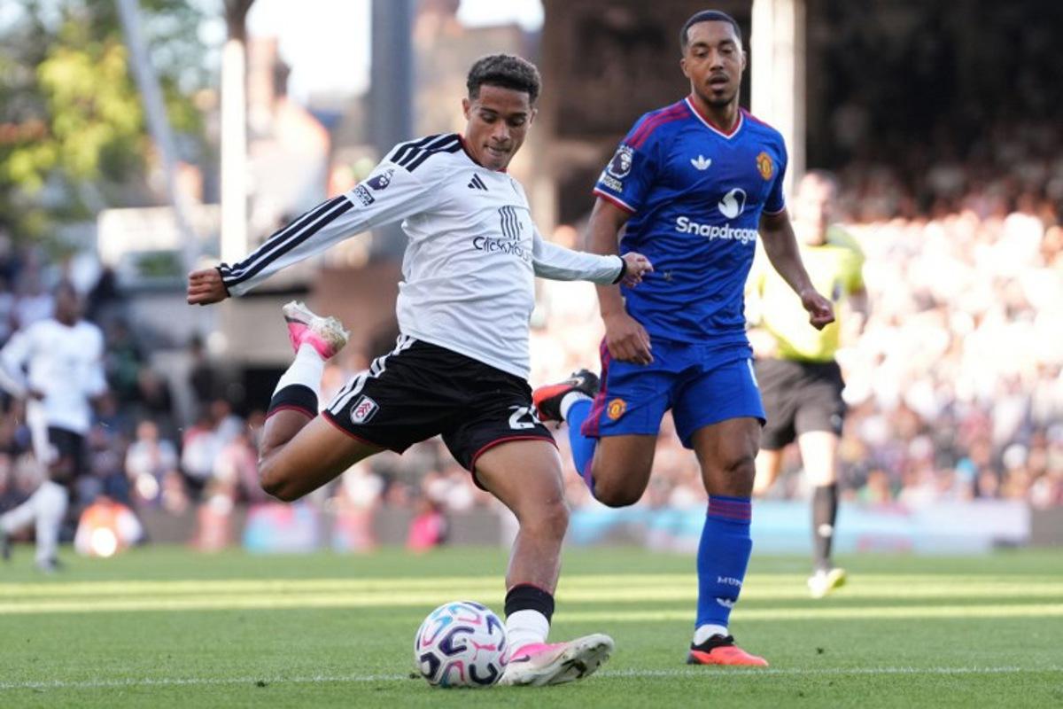 Fulham's English midfielder #24 Josh King shoots but fails to score during the English Premier League football match between Fulham and Manchester United at Craven Cottage in London on September 20, 2026.  CARLOS JASSO / AFP