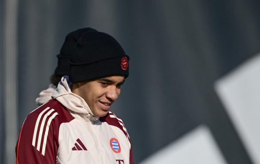 Bayern Munich's German midfielder #42 Jamal Musiala arrives for a training session on the eve of the UEFA Champions League Knockout round play-off second Leg match against Celtic on February 17, 2025 in in Munich.  Tobias Schwarz / AFP