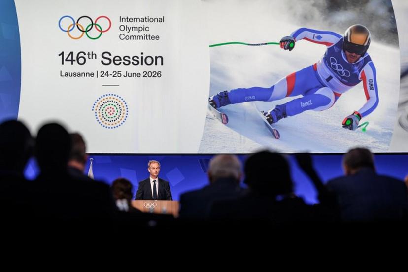 President of the Organizing Committee for the Alpes 2030 Winter Olympics Edgar Grospiron speaks during an extraordinary session of the International Olympic Committee (IOC) in Lausanne on June 25, 2026. The roughly 100 members of IOC approved on June 25, 2026 the re-inclusion of ski mountaineering in the program for the Alpes 2030 Olympic Winter Games, which will take place in the French Alps, after the "additional sport" made its Olympic debut at Milan-Cortina in 2026. Fabrice COFFRINI / AFP