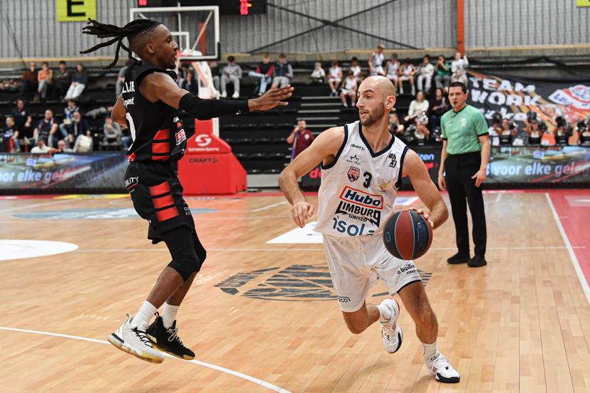 Kortrijk's Darren Williams and Limburg's Marijn Ververs pictured in action during a basketball match between Limburg United and House of Talents Spurs Kortrijk, Friday 05 December 2025 in Hasselt, on day 10 of the 'BNXT League' Belgian/ Dutch first division basket championship. BELGA PHOTO JILL DELSAUX