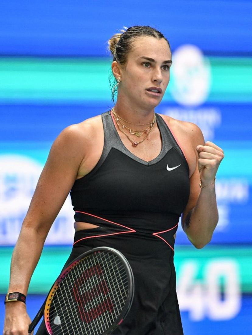 Belarus' Aryna Sabalenka celebrates after winning against Kazakhstan's Elena Rybakina during their women's singles quarterfinal match at the Wuhan Open tennis tournament in Wuhan, Central China's Hubei province on October 10, 2025.  ADEK BERRY / AFP