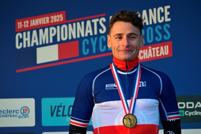 Gold medalist Clement Venturini celebrates during the podium ceremony of the France's men cyclo-cross French men's elite cyclo cross Championships in Pontchateau, western France on January 12, 2025.  Damien MEYER / AFP