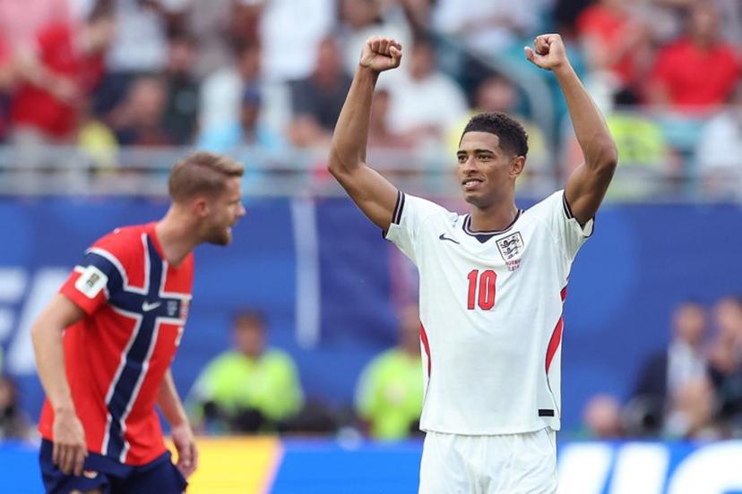 England's midfielder #10 Jude Bellingham celebrates after scoring his second goal during the first half of the extra-time of the 2026 World Cup football tournament quarter-final match between Norway and England at Miami Stadium in Miami Gardens on July 11, 2026.   PATRICIA DE MELO MOREIRA / AFP