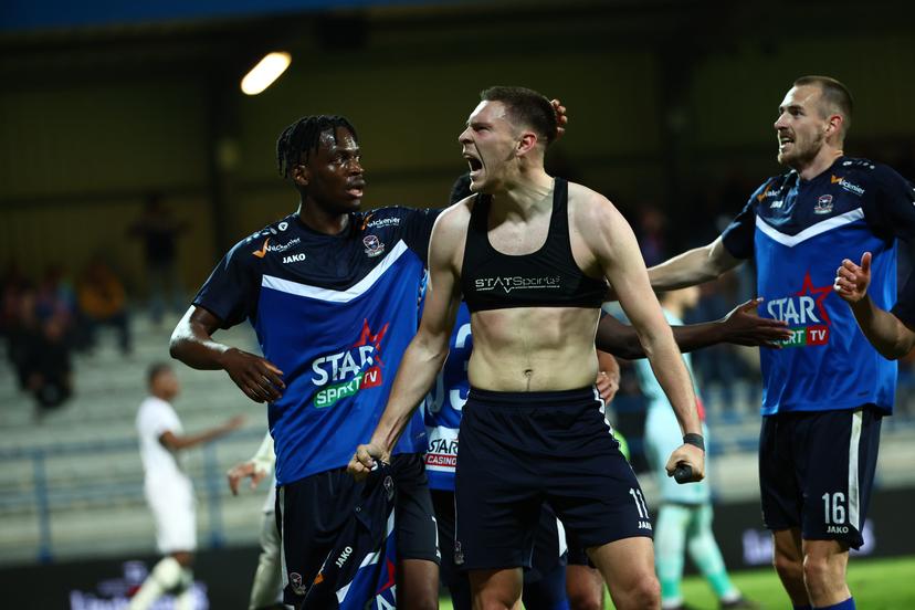Dender's Aurelien Scheidler celebrates after scoring during a soccer match between FCV Dender EH and Sporting Charleroi, Tuesday 22 April 2025 in Denderleeuw, on day 5 (out of 10) of the Europe Play-offs of the 2024-2025 'Jupiler Pro League' first division of the Belgian championship. BELGA PHOTO DAVID PINTENS
