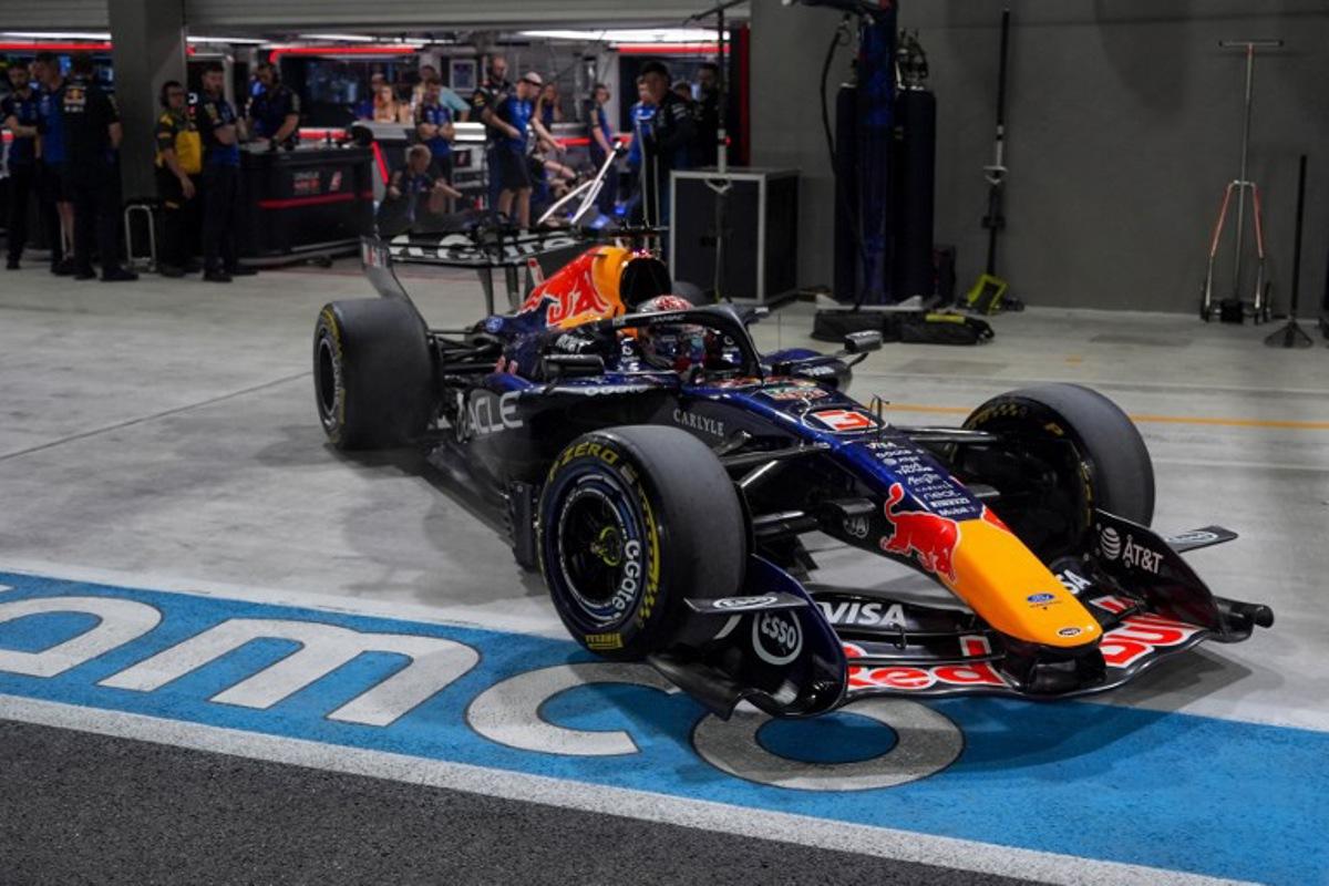 Red Bull Racing's Dutch driver Max Verstappen drives in the pits during the sprint qualifying session ahead of the Formula One Singapore Grand Prix at the Marina Bay Street Circuit in Singapore on October 9, 2026.  Ng Han Guan / POOL / AFP