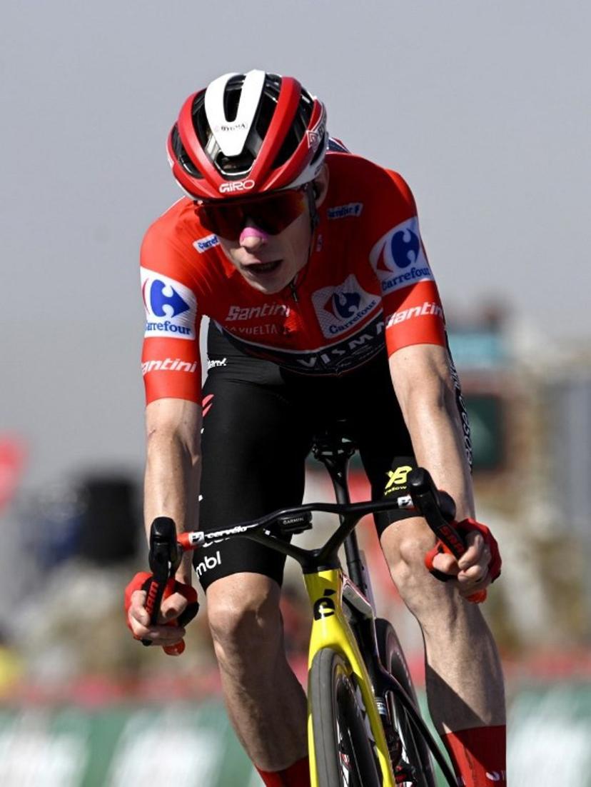 Second placed, overall leader of the Team Visma-Lease a Bike, Danish rider Jonas Vingegaard, crosses the finish line of the 13th stage of the Vuelta a Espana, a 202 km race between Cabezon de la Sal and L'Angliru, on September 5, 2025.    Miguel RIOPA / AFP