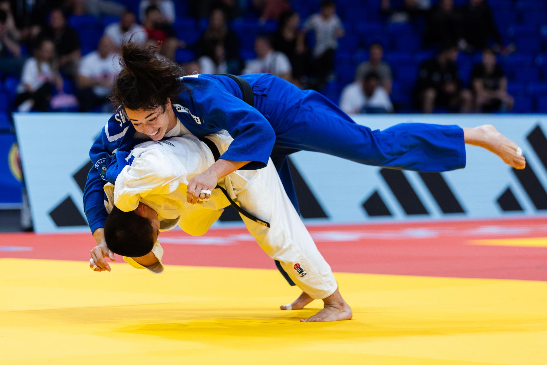 Belgian Gabriella Willems (blue gi) and Spanish Ai Tsunoda Roustant (white gi) pictured in action during a bout in the Women's -70kg category, at the European Judo Championships in Podgorica, Montenegro, on Friday 25 April 2025. The tournament is taking place from 23 tot 27 April 2025. BELGA PHOTO NIKOLA KRISTC