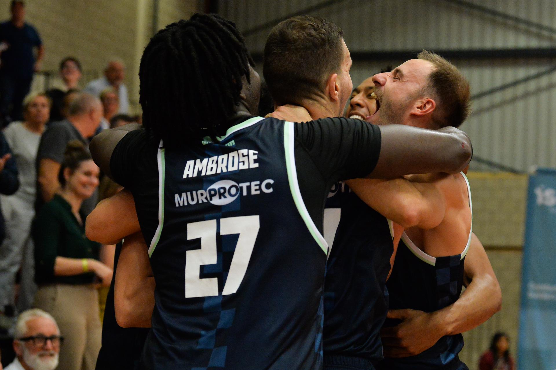 Brussels' players celebrate after winning a basketball match between Limburg United and Brussels, Friday 03 October 2025 in Mechelen, on day 2 of the 'BNXT League' Belgian/ Dutch first division basket championship. BELGA PHOTO JILL DELSAUX