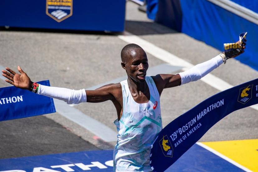 Kenyan distance runner John Korir crosses the finish line as he wins the men's race during the 129th Boston Marathon on April 21, 2025, in Boston, Massachusetts.  The marathon includes around 30,000 athletes from 129 countries running the 26.2 miles from Hopkinton to Boston, Massachusetts.  The event is the world's oldest annually run marathon.  Joseph Prezioso / AFP