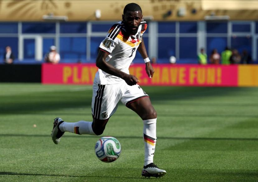 (FILES) Germany's defender #02 Antonio Ruediger controls the ball during the 2026 World Cup round of 32 football match between Germany and Paraguay at the Boston Stadium in Foxborough on June 29, 2026. Germany defender Antonio Rudiger on September 1, 2026 announced his international retirement, two months after last playing for Germany at the 2026 World Cup. The 33-year-old made 86 appearances for the four-time world champions.  FRANCK FIFE / AFP