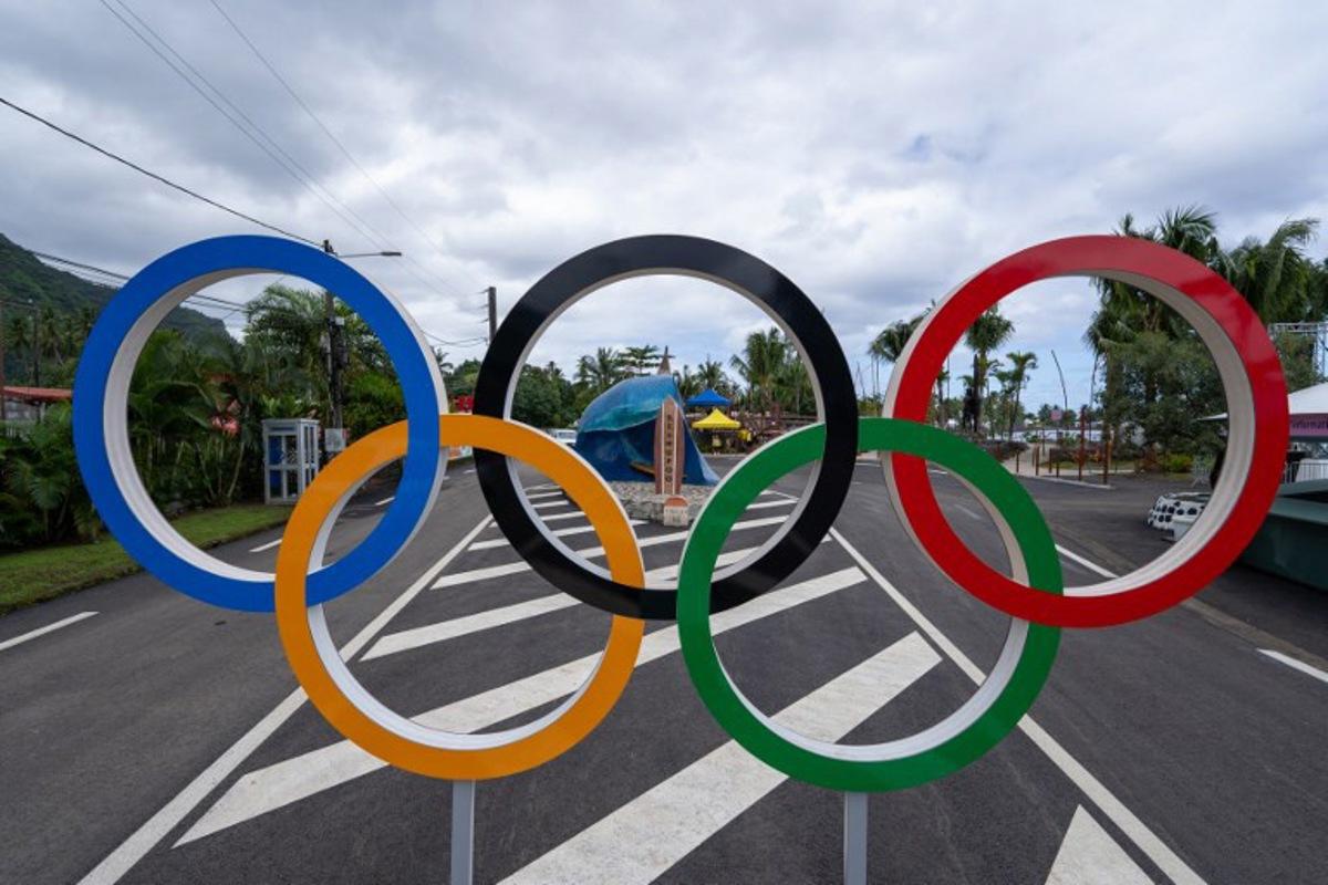 This photograph shows the Olympics rings on the "End of the road" to Teahupo'o on the island of Tahiti, French Polynesia on July 20, 2024, ahead of the opening ceremony of the Paris 2024 Olympic and Paralympic Games.  Jerome Brouillet / AFP