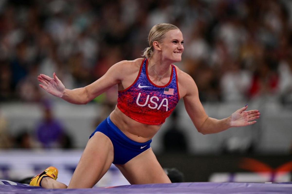 US' athlete Katie Moon celebrates clreaing the crossbar as she competes in the women's pole vault final during the World Athletics Championships in Tokyo on September 17, 2025.  Ben STANSALL / AFP