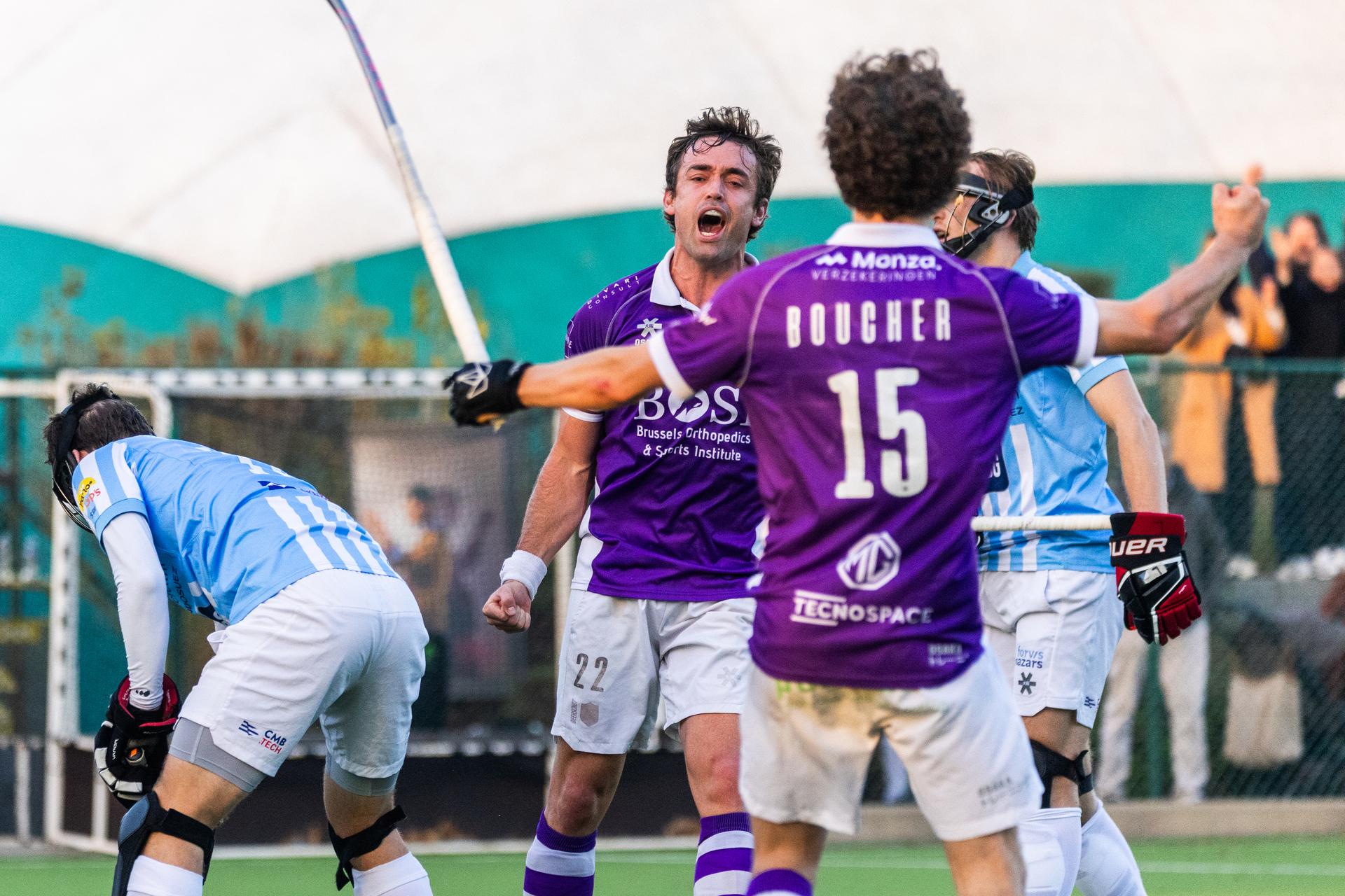 Beerschot's Daniel Bell (C) celebrates with Beerschot's  Julien Boucher at a hockey game between Beerschot and Gantoise, Sunday 09 November 2025 in Boussu, on day 10 of the Belgian first division hockey championship. BELGA PHOTO PAULINE SCHUMACKER