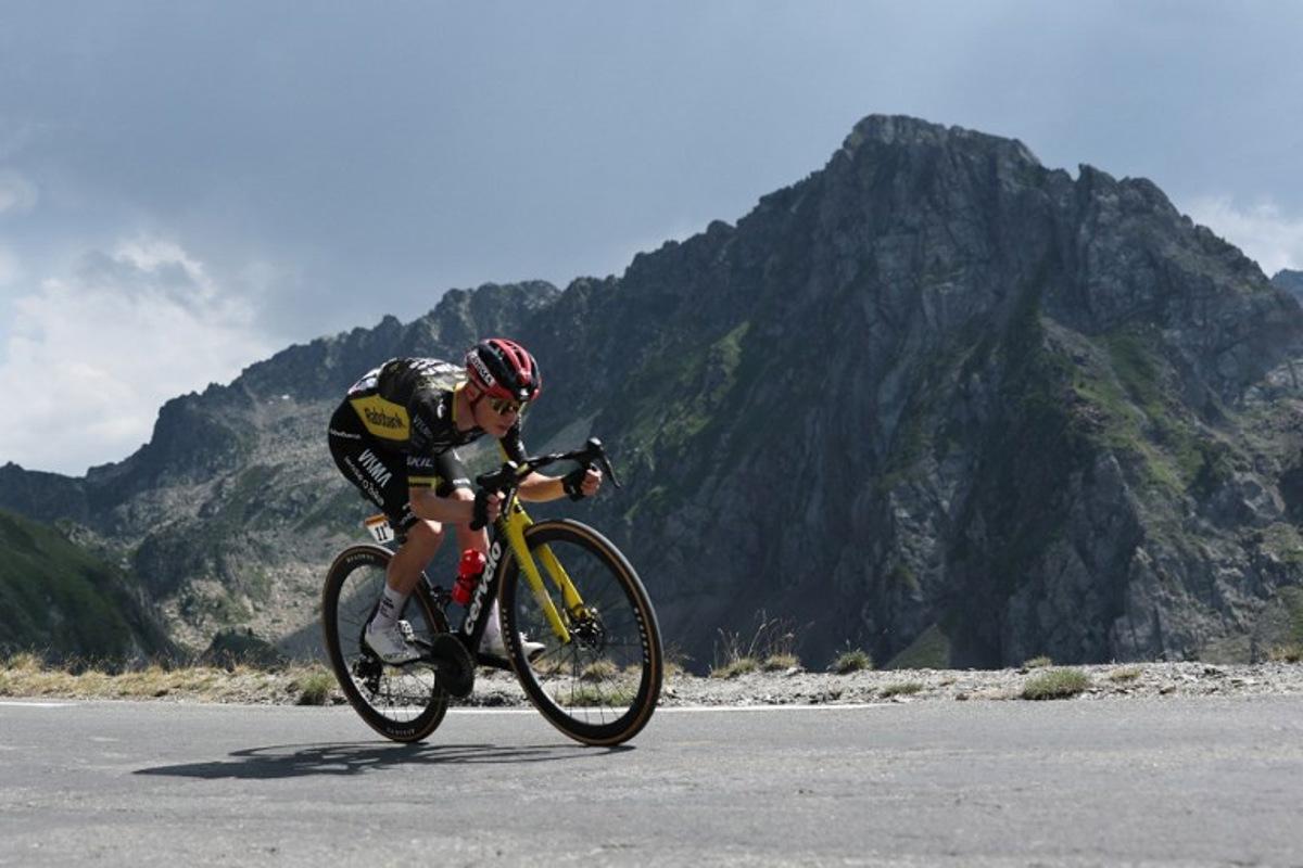 Team Visma | Lease a Bike's Danish rider Jonas Vingegaard cycle in the descent of Col du Tourmalet during the 6th stage of the 113th edition of the Tour de France cycling race, 186,2 km between Pau and Gavarnie-Gèdre in the French Pyrenees, on July 9, 2026.  Anne-Christine POUJOULAT / AFP