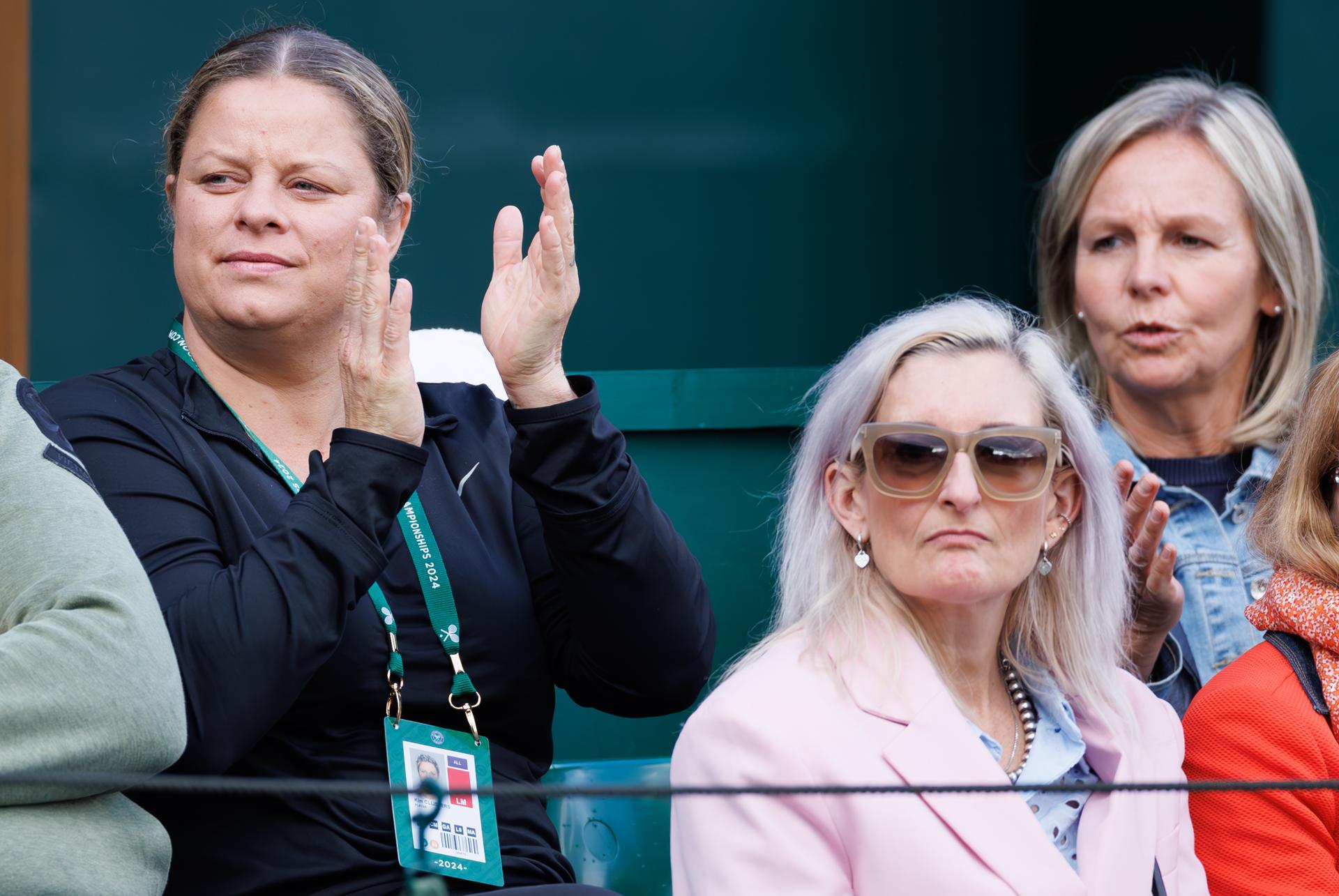 Former tennis number 1 Kim Clijsters, Vandromme's mother Corine Blondeel and pictured during a tennis match between Belgian Vandromme and Korean Jang, in round 1 of the girls singles of the 2024 Wimbledon grand slam tournament at the All England Tennis Club, in south-west London, Britain, Sunday 07 July 2024. BELGA PHOTO BENOIT DOPPAGNE