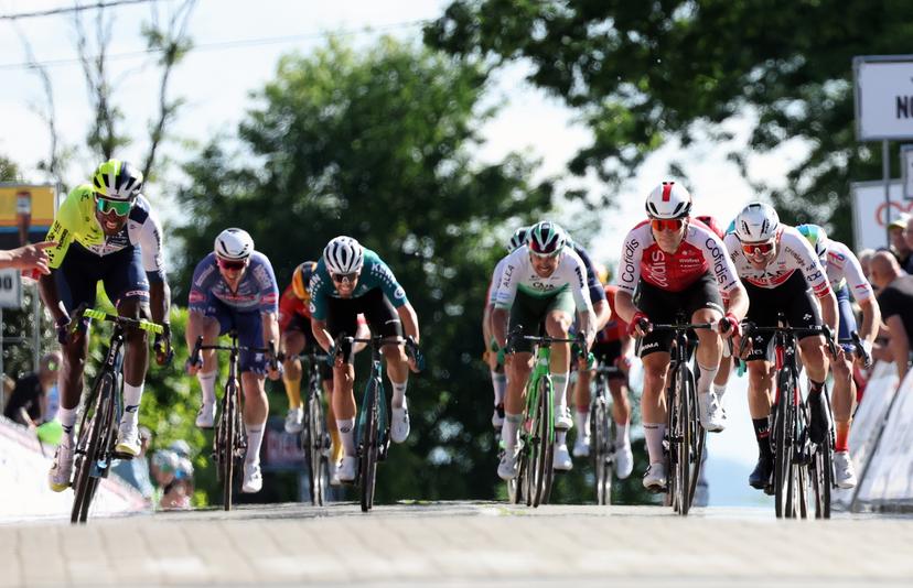 Eritrean Biniam Girmay Hailu of Intermarche-Wanty, French Axel Zingle of Cofidis and Swiss Mark Hirschi of UAE Team Emirates sprint to the finish of the Circuit Franco-Belge cycling race, 190,6 km from Tournai to Mont-de-l'Enclus, stage 6 (out of 9) of the Lotto Cycling Cup, Wednesday 29 May 2024. BELGA PHOTO VIRGINIE LEFOUR