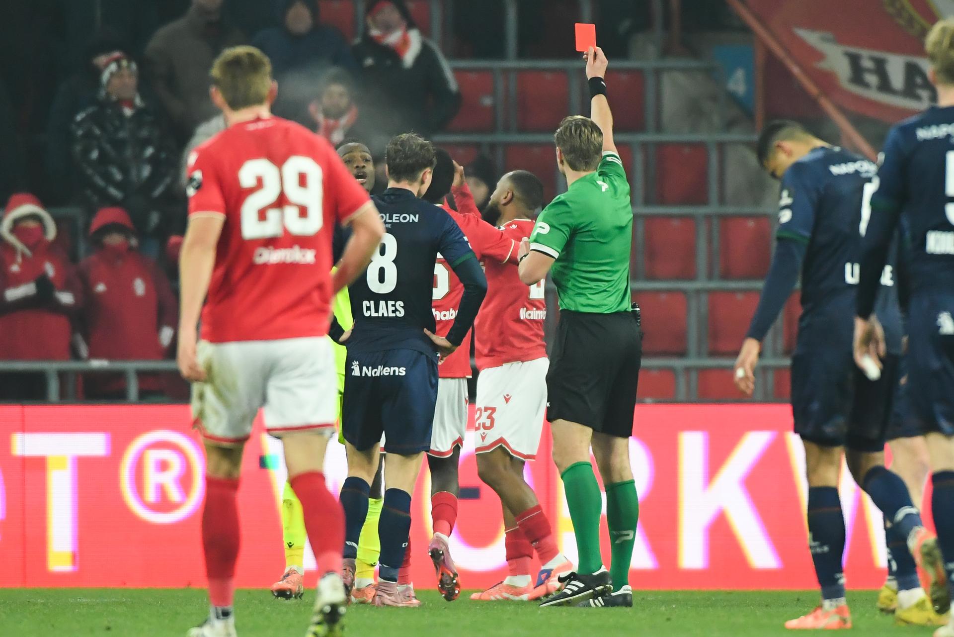 Standard's Marco Ilaimaharitra receives a red card from the referee during a soccer match between Standard de Liege and Zulte Waregem, Friday 21 November 2025 in Liege, on day 15 of the 2025-2026 'Jupiler Pro League' first division of the Belgian championship. BELGA PHOTO JILL DELSAUX