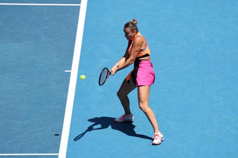 Belarus' Aryna Sabalenka hits a return against China's Bai Zhuoxuan during their women's singles match on day four of the Australian Open tennis tournament in Melbourne on January 21, 2026.  Izhar Khan / AFP