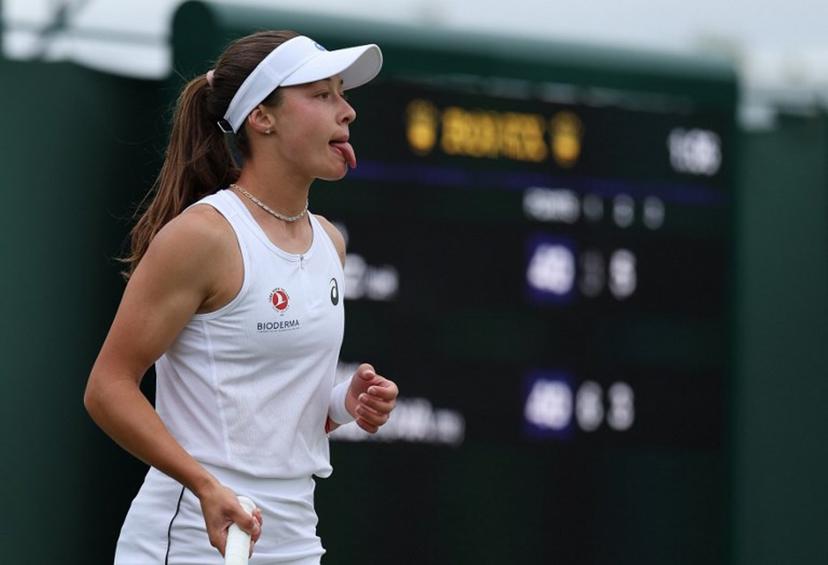 Turkey's Zeynep Sonmez reacts after missing a shot as she plays against Russia's Ekaterina Alexandrova during their women's singles third round tennis match on the sixth day of the 2025 Wimbledon Championships at The All England Lawn Tennis and Croquet Club in Wimbledon, southwest London, on July 5, 2025.  Adrian Dennis / AFP