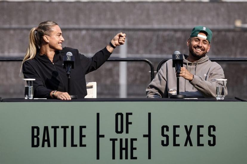 Belarus' Aryna Sabalenka (L) and Australia's Nick Kyrgios react during a press conference on the eve of the Battle of the Sexes exhibition match between Sabalenka and Kyrgios at Atlantis The Royal, in Dubai on December 27, 2025.  FADEL SENNA / AFP