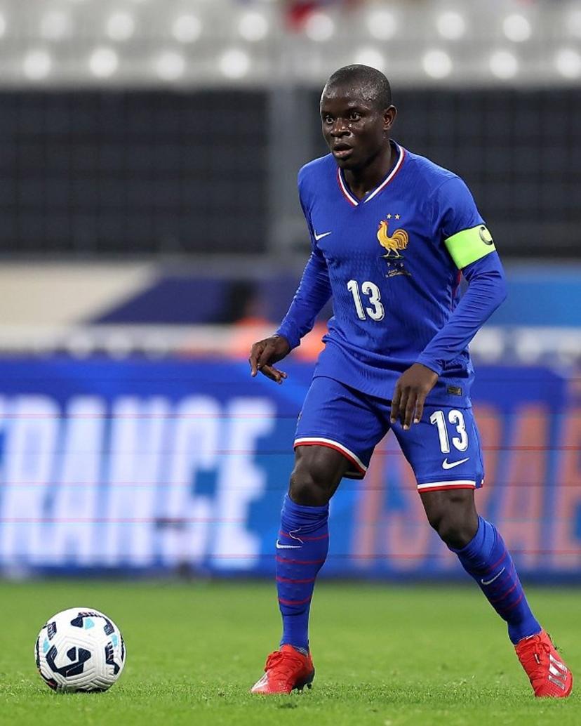 France's midfielder #13 N'Golo Kante runs with the ball during attends the UEFA Nations League, League A Group A2 football match between France and Israel at the Stade de France stadium in Saint-Denis, in the northern outskirts of Paris, on November 14, 2024.  FRANCK FIFE / AFP