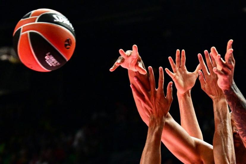 Players jump for the ball  during the EuroLeague "Final Four" semi-final basketball match between Valencia Basket Club and Real Madrid Baloncesto at the Telekom Center Athens in Athens on May 22, 2026.  Angelos TZORTZINIS / AFP