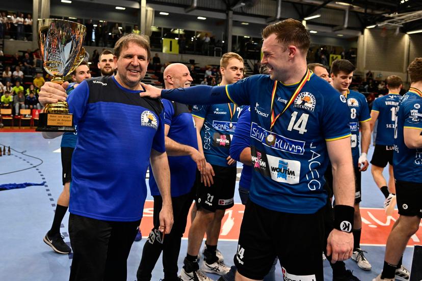 Bocholt's head coach Luc Boiten and Bocholt's Serge Spooren celebrate after winning a game between Achilles Bocholt and Sporting Pelt, the men's final of the Belgian handball cup, Saturday 01 April 2023, in Hasselt. BELGA PHOTO JOHAN EYCKENS