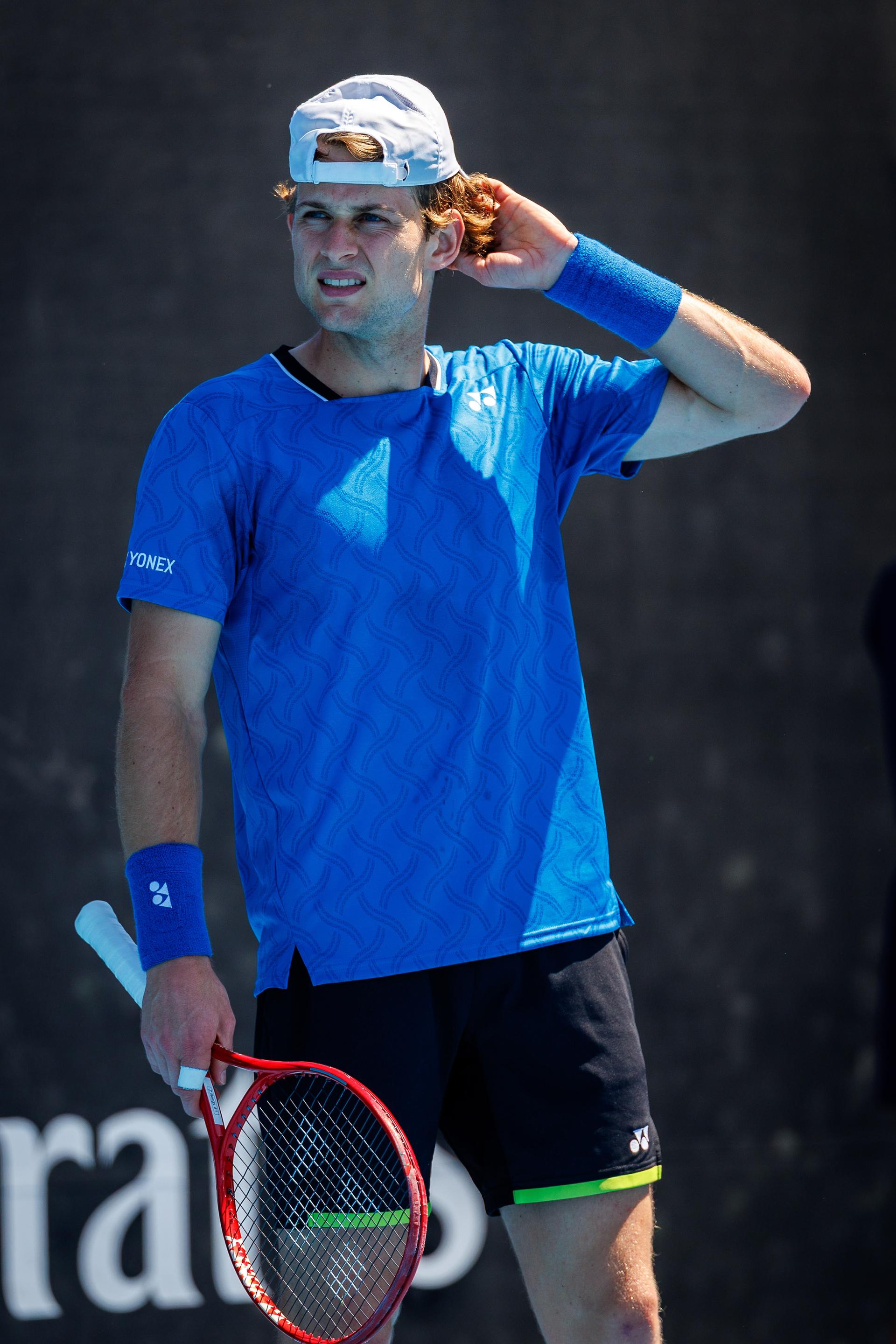 Belgian Zizou Bergs pictured during a first round match of Belgium's Bergs/Collignon against Australia's pair McCabe/Tu in the men doubles at the Australian Open, Melbourne Park, Melbourne on Wednesday 21 January 2026. McCabe/Tu won the game. BELGA PHOTO PATRICK HAMILTON  --- BENELUX ONLY   ---
