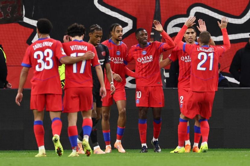Paris Saint-Germain's French forward #10 Ousmane Dembele (3rd R) celebrates scoring the 2-6 goal with his teammates during the UEFA Champions League football match between Bayer 04 Leverkusen and Paris Saint-Germain (PSG) at the BayArena stadium in Leverkusen, western Germany on October 21, 2025.  FRANCK FIFE / AFP