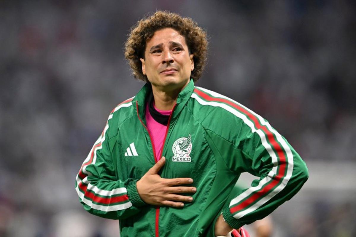 Mexico's goalkeeper #13 Guillermo Ochoa reacts after losing the 2026 World Cup round of 16 football match between Mexico and England at the Mexico City Stadium in Mexico City on July 5, 2026.   CARL DE SOUZA / AFP
