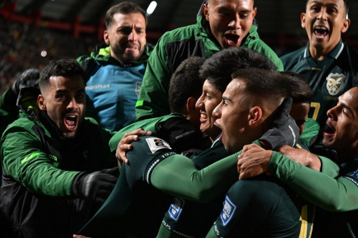 Bolivia's forward #07 Miguel Terceros (C) celebrates with his teammates after scoring his team's first goal during the 2026 FIFA World Cup South American qualifiers football match between Bolivia and Brazil, at the Municipal de El Alto stadium, in El Alto, La Paz department, Bolivia on September 9, 2025.   AIZAR RALDES / AFP