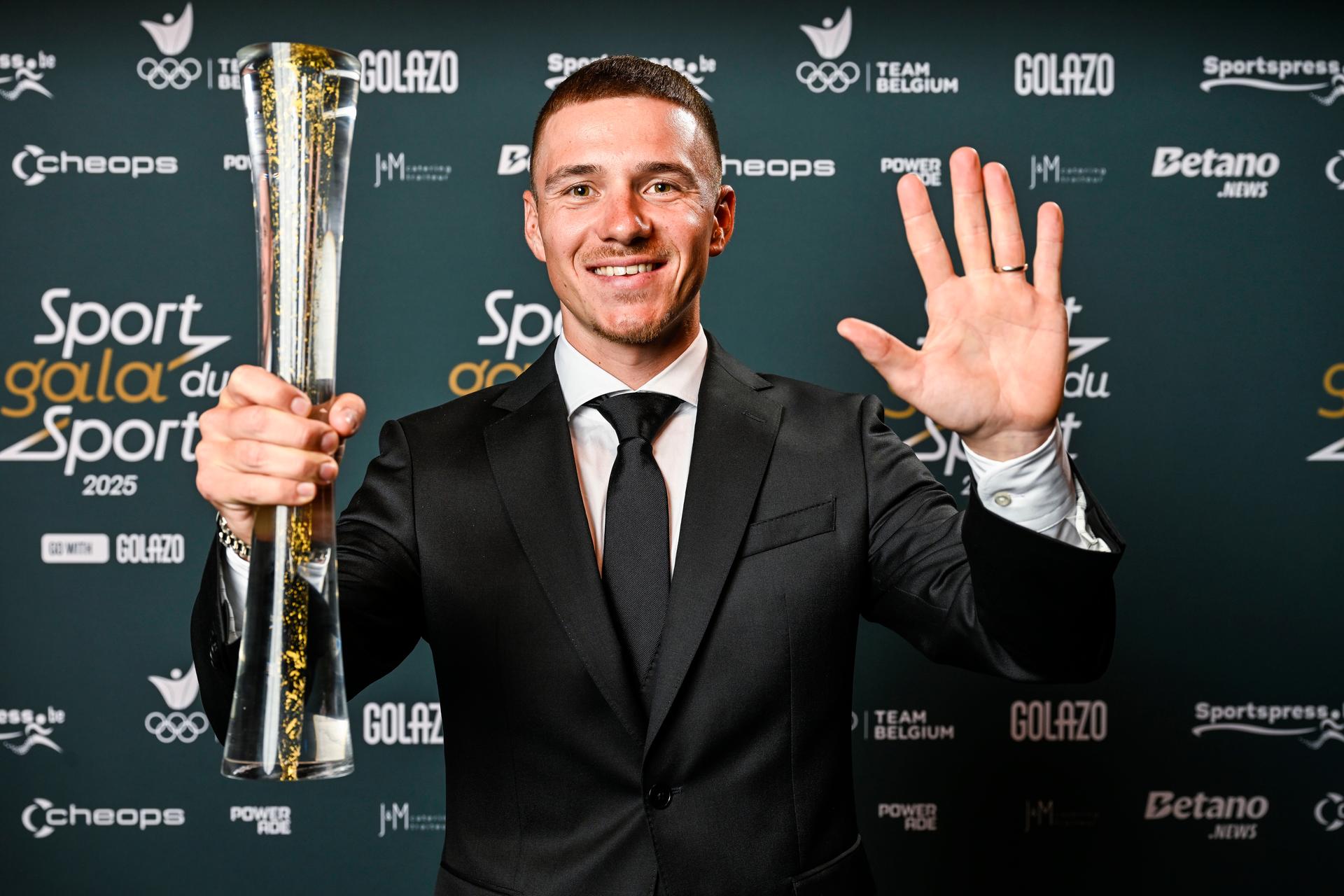 Remco Evenepoel poses for the photographer after winning the Sportman van het Jaar / Sportif de l Année 2025 at the 'Sportgala' award show, to announce the sport women and men of the year 2025, Sunday 14 December 2025 in Schelle. BELGA PHOTO POOL NICO VEREECKEN