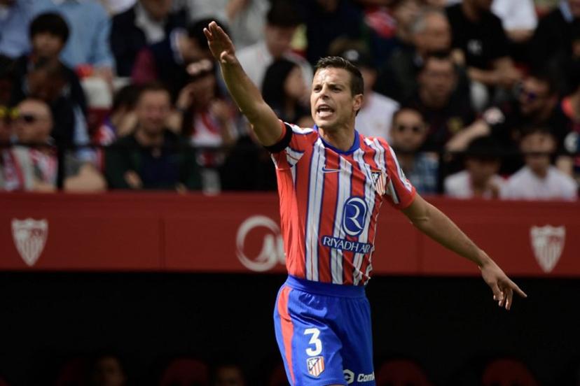 Atletico Madrid's Spanish defender #03 Cesar Azpilicueta gestures during the Spanish league football match between Sevilla FC and Club Atletico de Madrid at the Ramon Sanchez Pizjuan stadium in Seville on April 6, 2025.  CRISTINA QUICLER / AFP