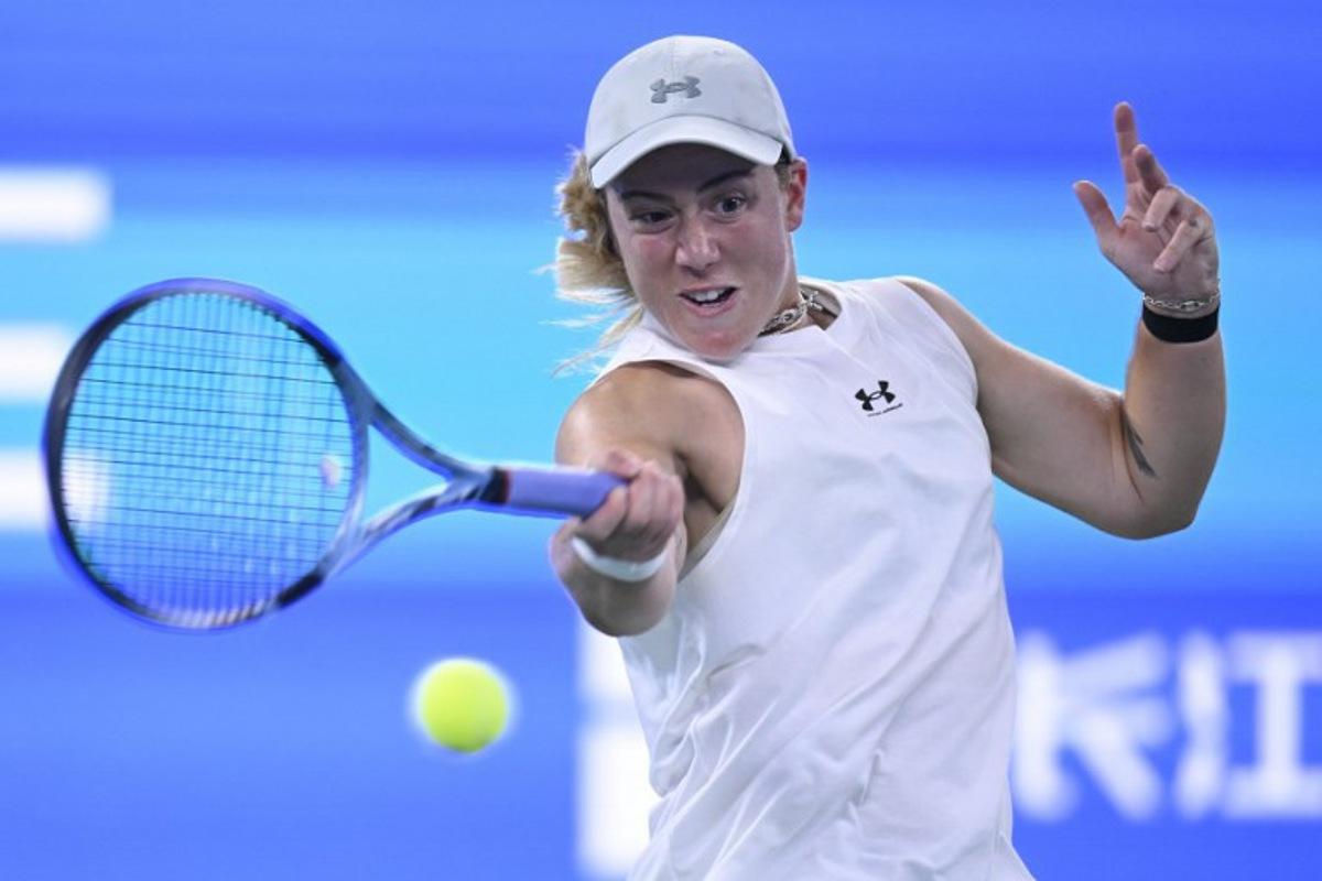 Britain's Sonay Kartal hits a return to Ukraine's Elina Svitolina during the women's singles quarter final match at the Wuhan Open tennis tournament in Wuhan, China's Hubei province on October 16, 2026.  WANG Zhao / AFP