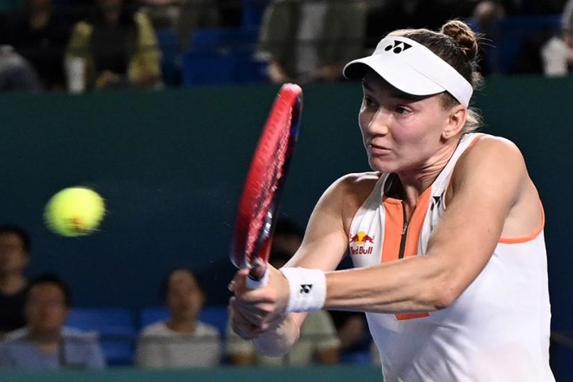 Kazakhstan's Elena Rybakina hits a return to Italy's Jasmine Paolini during their women's singles semi-final match at the WTA Ningbo Open tennis tournamen in Ningbo, in China's eastern Zhejiang province on October 18, 2025.  AFP