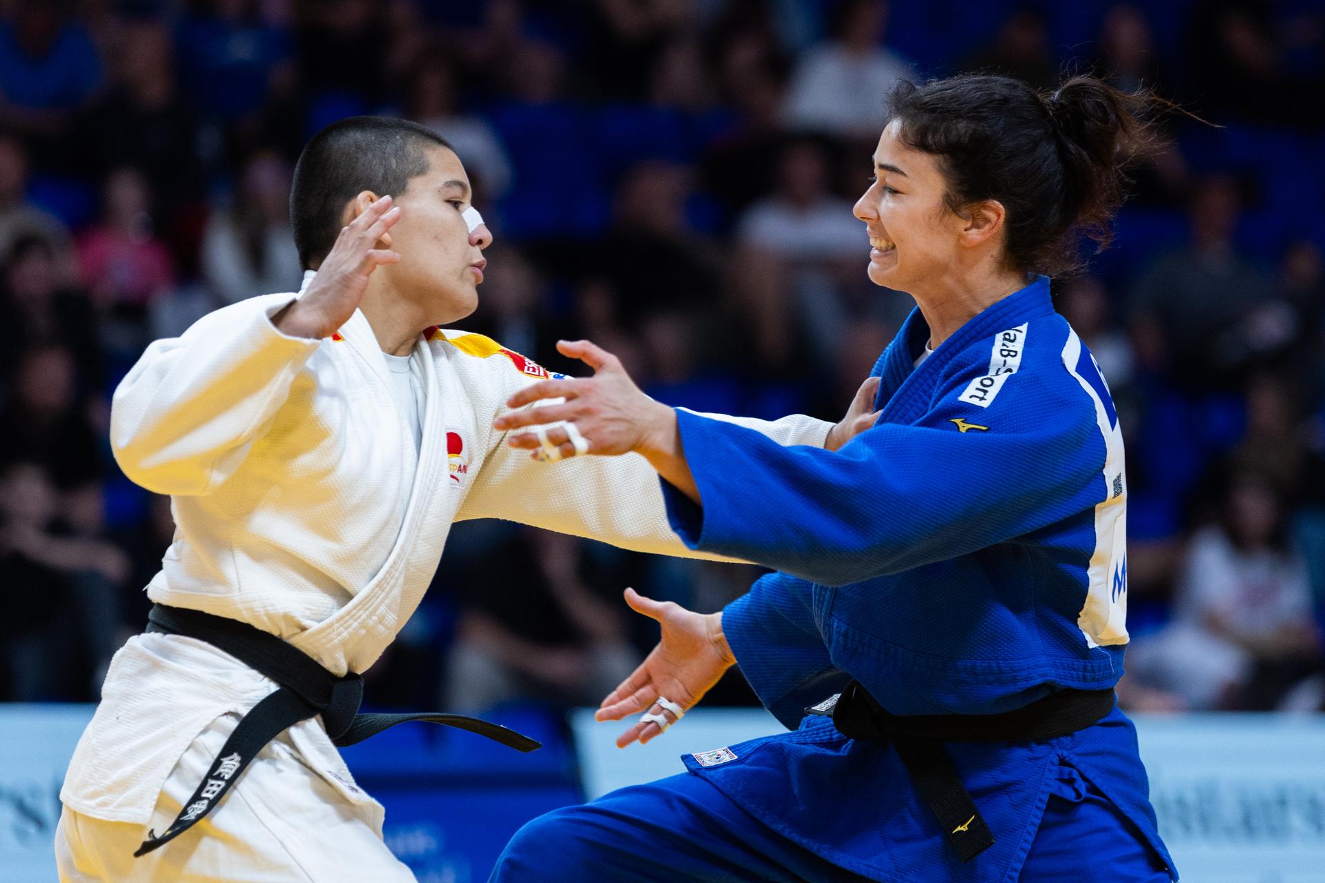 Belgian Gabriella Willems (blue) and Spanish Tsunoda Roustant Ai (white) pictured in action during a fight in the Women -70kg, at the European Judo Championships in Podgorica, Montenegro, on Friday 25 April 2025. The tournament is taking place from 23 tot 27 April 2025.  BELGA PHOTO NIKOLA KRISTC