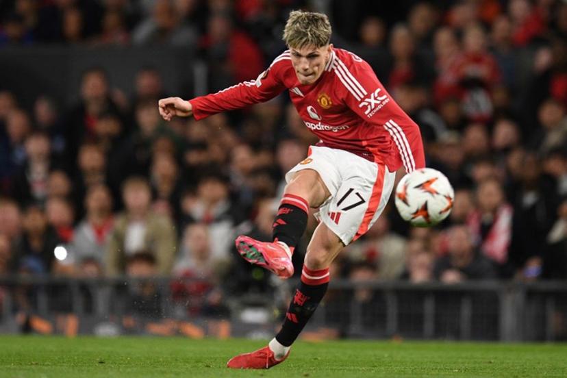 Manchester United's Argentinian midfielder #17 Alejandro Garnacho shoots but fails to score during the UEFA Europa league quarter-final final, second leg football match between Manchester United and Lyon at Old Trafford stadium in Manchester, north west England, on April 17, 2025.  Oli SCARFF / AFP