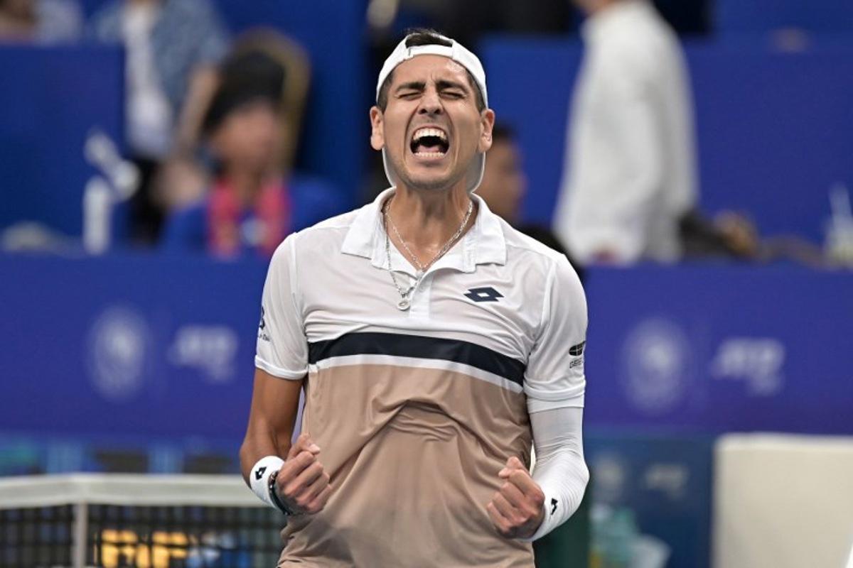 Chile's Alejandro Tabilo celebrates beating USA's Brandon Nakashima in their men's singles semi-final match at the Chengdu Open tennis tournament in Chengdu, in China's southwest Sichuan province on September 22, 2025.  STR / AFP