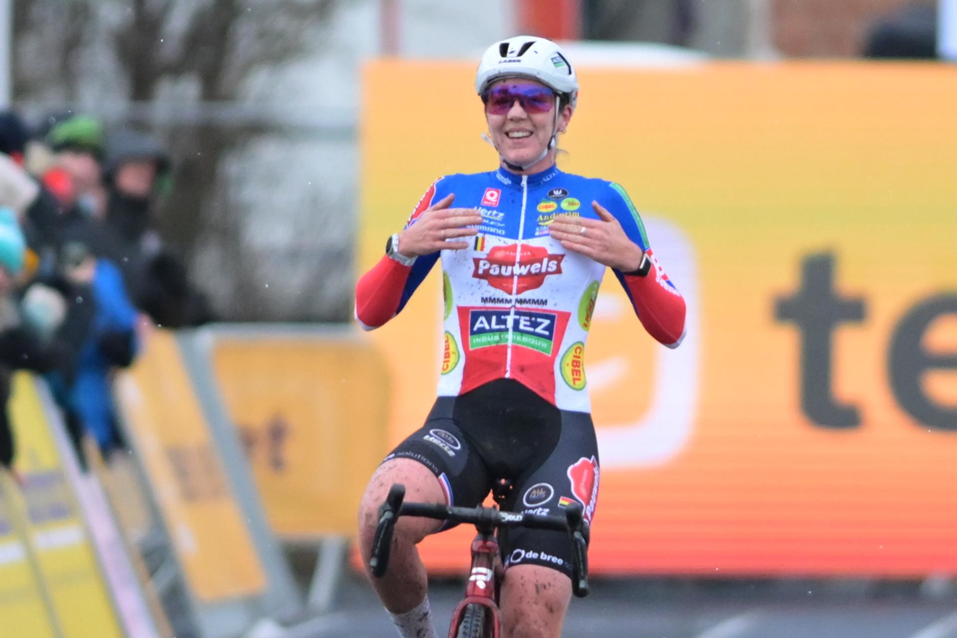 French Amandine Fouquenet celebrates as she crosses the finish line to win the women elite race at the cyclocross cycling event in Gullegem on Saturday 03 January 2026,  stage 7/8 in the Superprestige cyclocross cycling competition BELGA PHOTO DAVID PINTENS